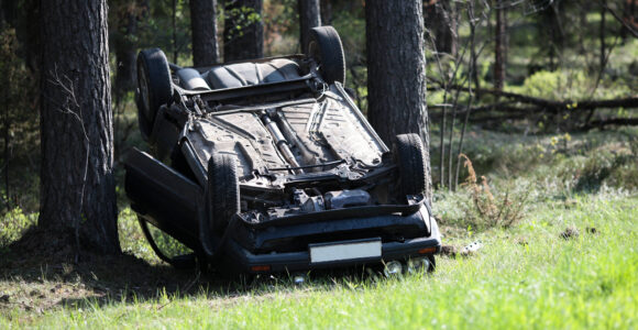 Rollover car accident in the woods